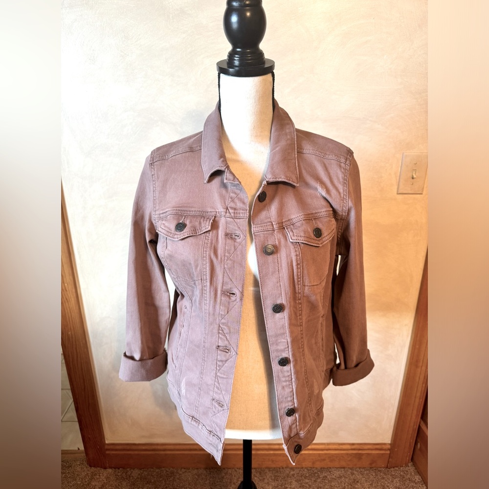 Size medium denim jacket in a dusty rose color.  In good condition.